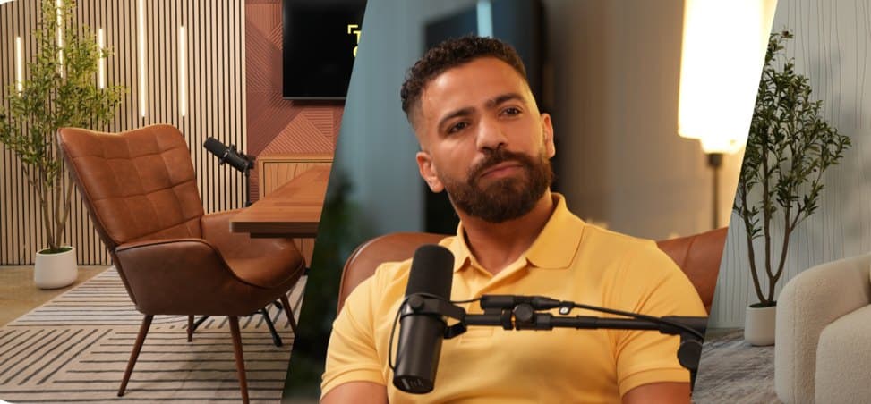Podcast guest in a yellow polo at the microphone on the leather armchair set